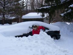 Lady shoveling.