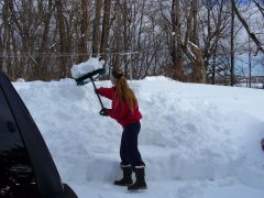 Not only is the snow heavy, you have to throw it over a 5 foot snow bank!