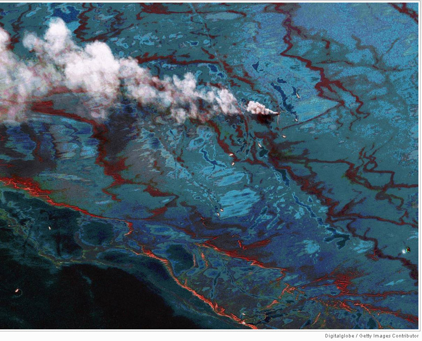 In this satellite image, vessels, strands of oil and a fire are seen at the site of the oil spill on June 15 in the Gulf of Mexico. Two months after a blowout of an oil rig led o the worst environmental disaster in U.S. history, BP and the federal governm