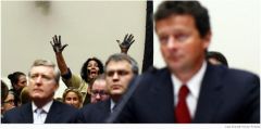 A protestor covered in black interrupts proceedings June 17 as BP CEO Tony Hayward testifies in front of the House Energy and Commerce Subcommittee on Oversight and Investigations.